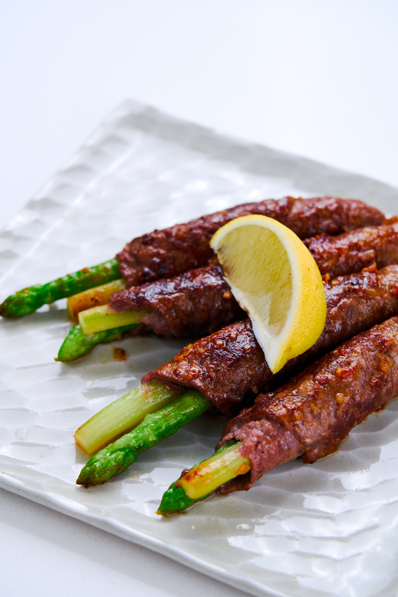 Beef & Asparagus Rolls on a plate