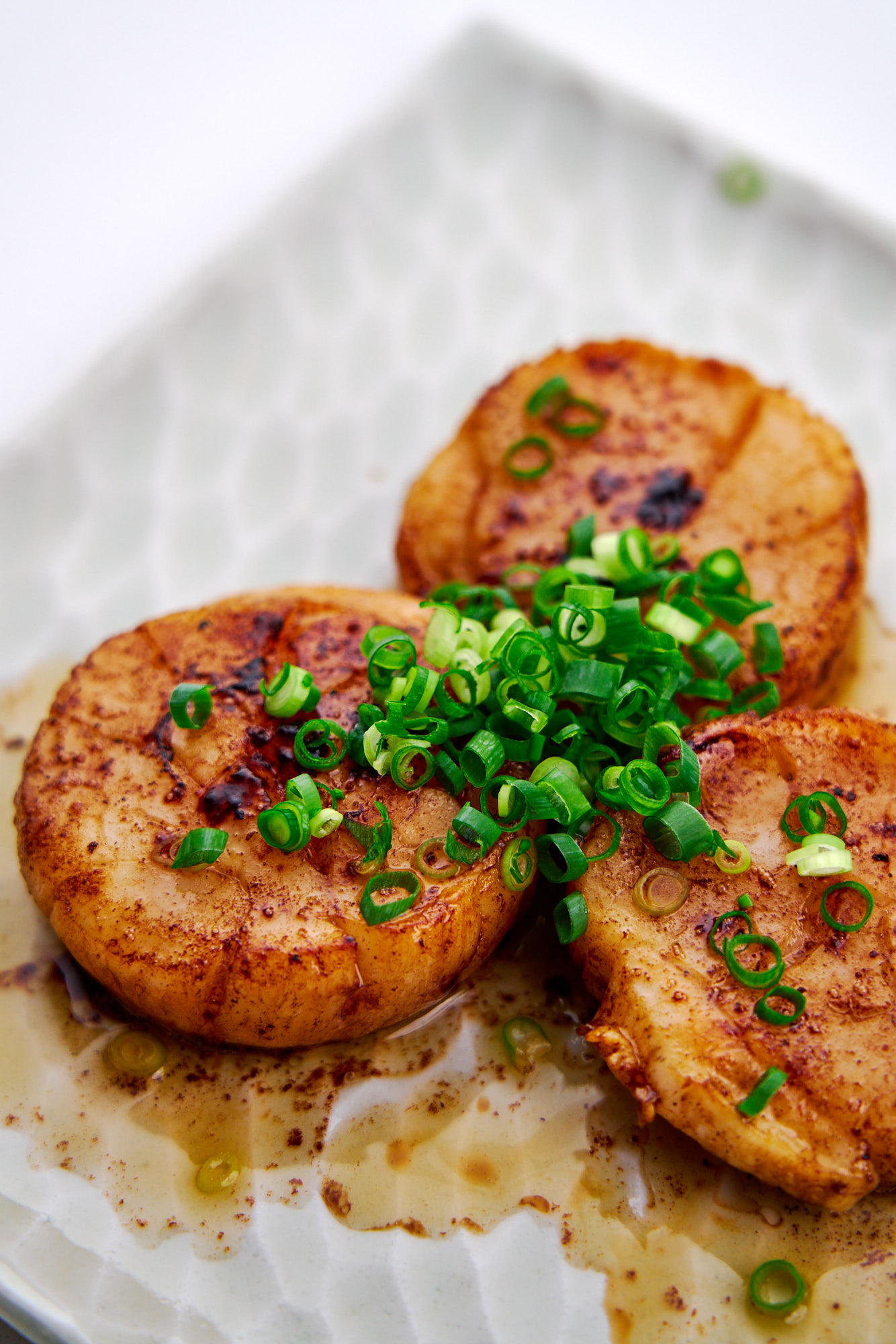 Browned Butter Soy Sauce Scallops on a plate