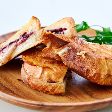 A plate of Blackberry Gouda Grilled Cheese Sandwiches