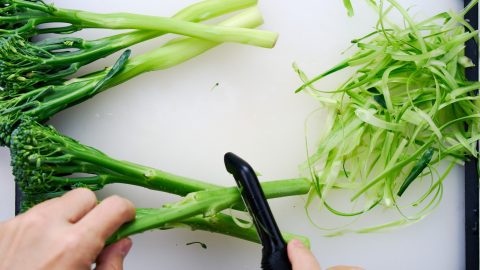 Peeling the stems of broccolini for Broccolini with Smoked Salmon and Eggs