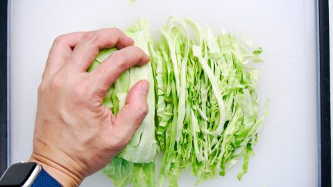 Slicing the cabbage for Gyoza Salad