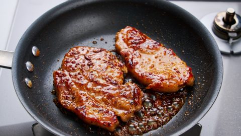 Maple Mustard Glazed Pork Chops in a pan.