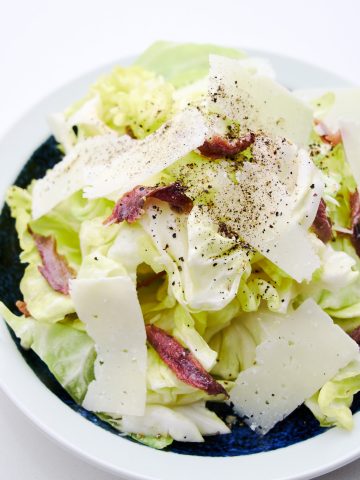 Savory cheese and anchovies are the perfect counterpoint to sweet tender spring cabbage.
