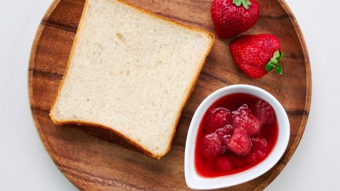 Bread, strawberries, and Strawberry Preserves.