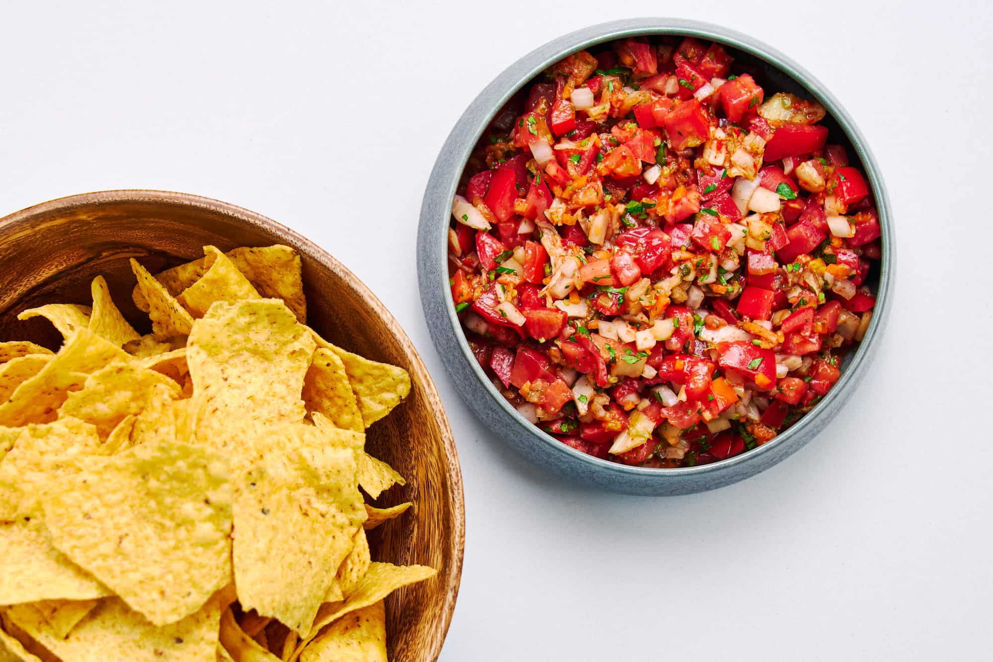 Spicy kimchi salsa with tortilla chips.