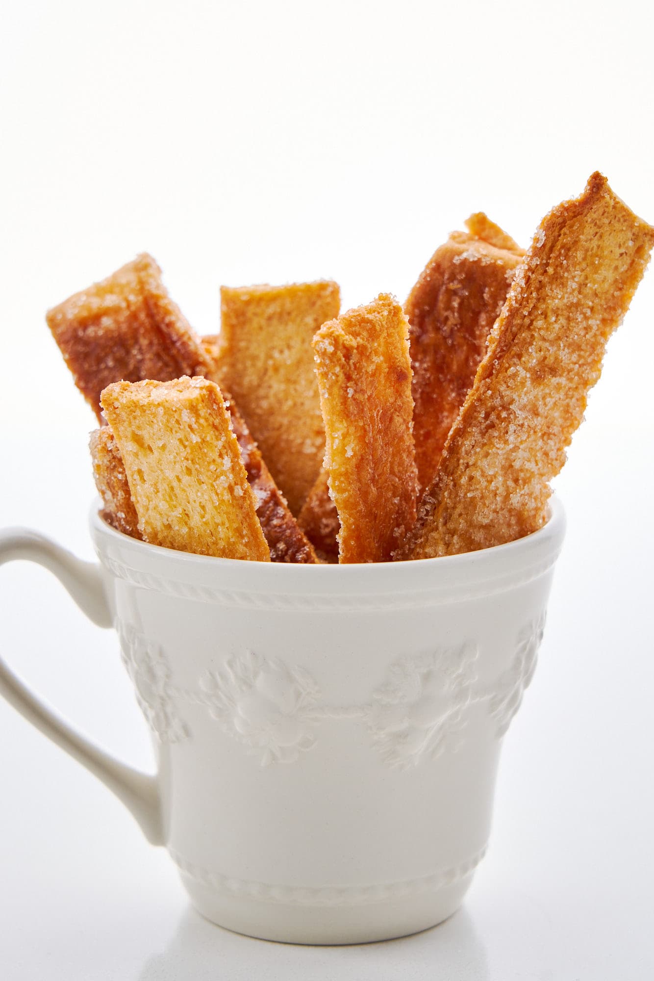 White mug with sweet and buttery Japanese rusk.