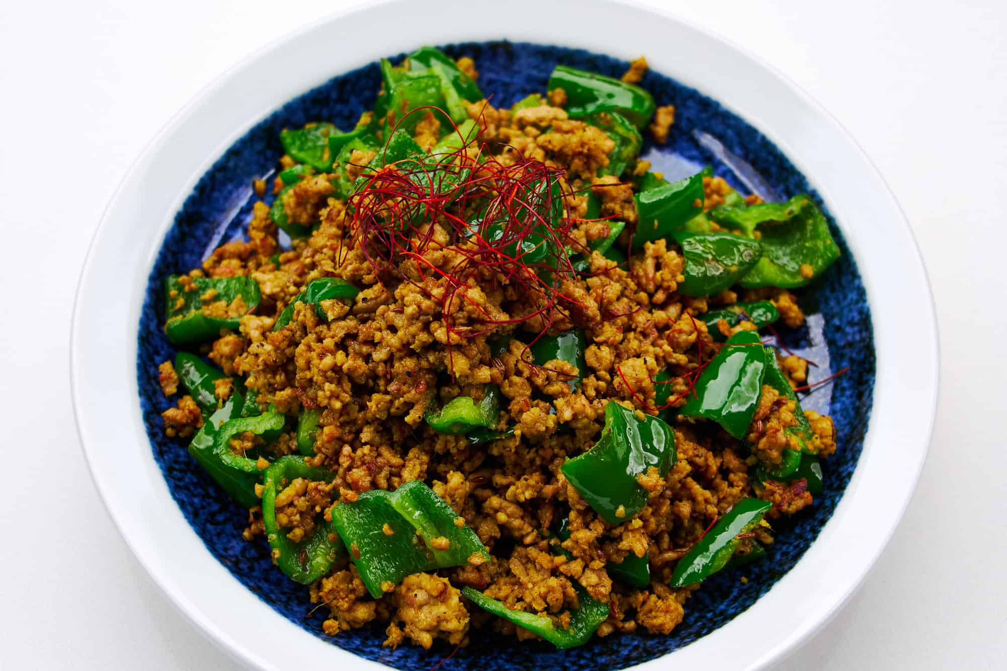 Green pepper and ground pork dry curry.