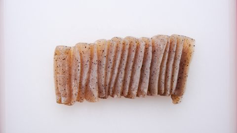 Konyaku (konjac) sliced thinly.