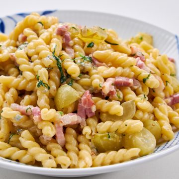 Gemelli tossed with pan roasted grapes and pancetta in gorgonzola cheese sauce.