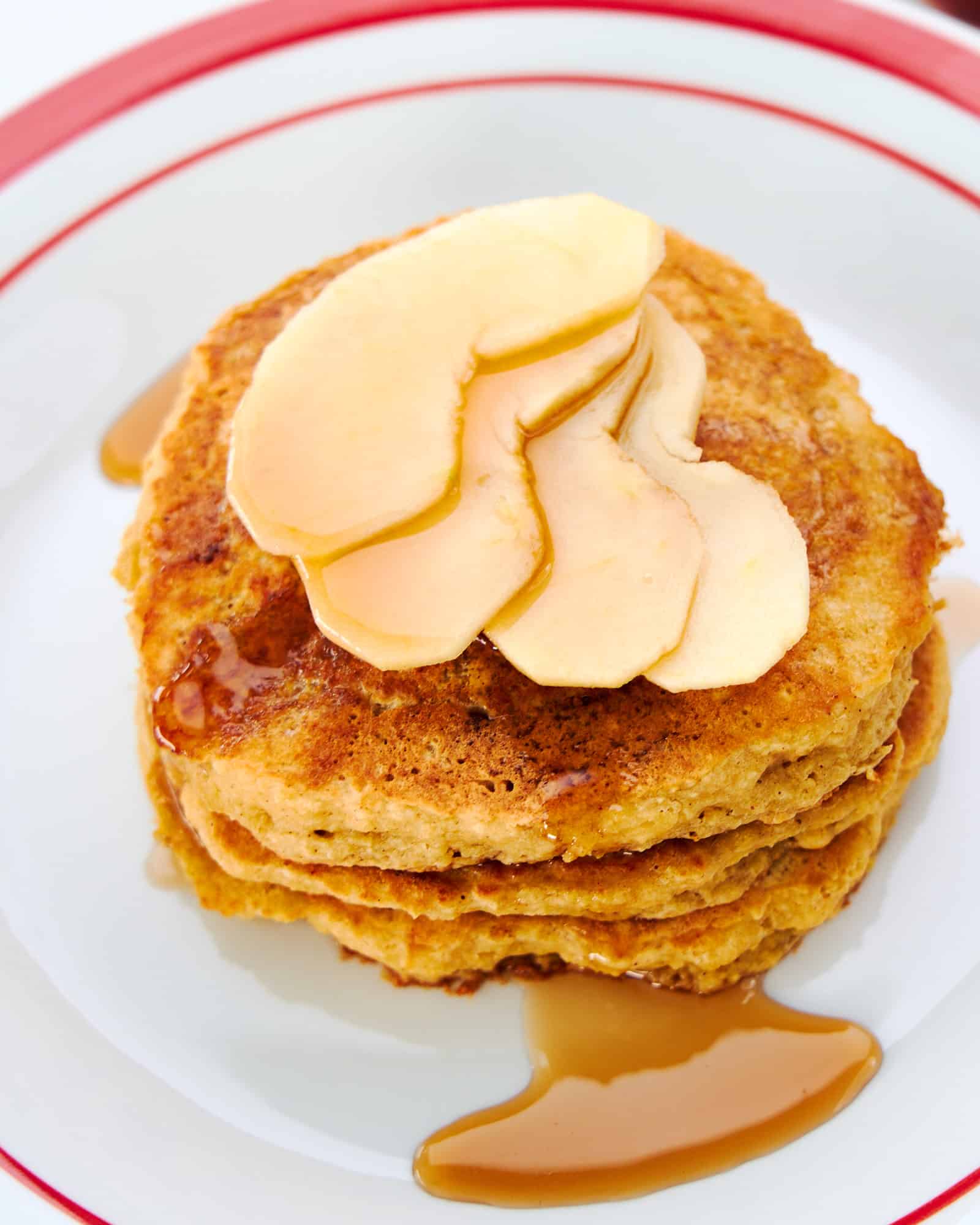A stack of Apple Pie Pancakes on a plate