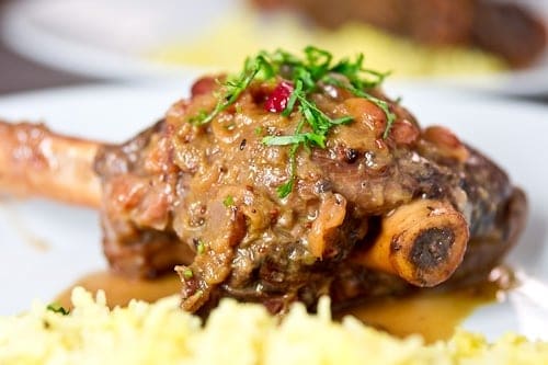 Braised lamb shanks ready to enjoy.