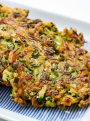 Close view of crispy zucchini pancakes.