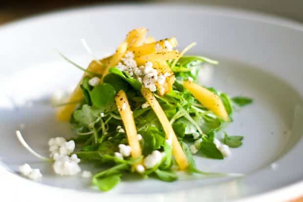 Green peaches add a crisp sour accent to this salad.