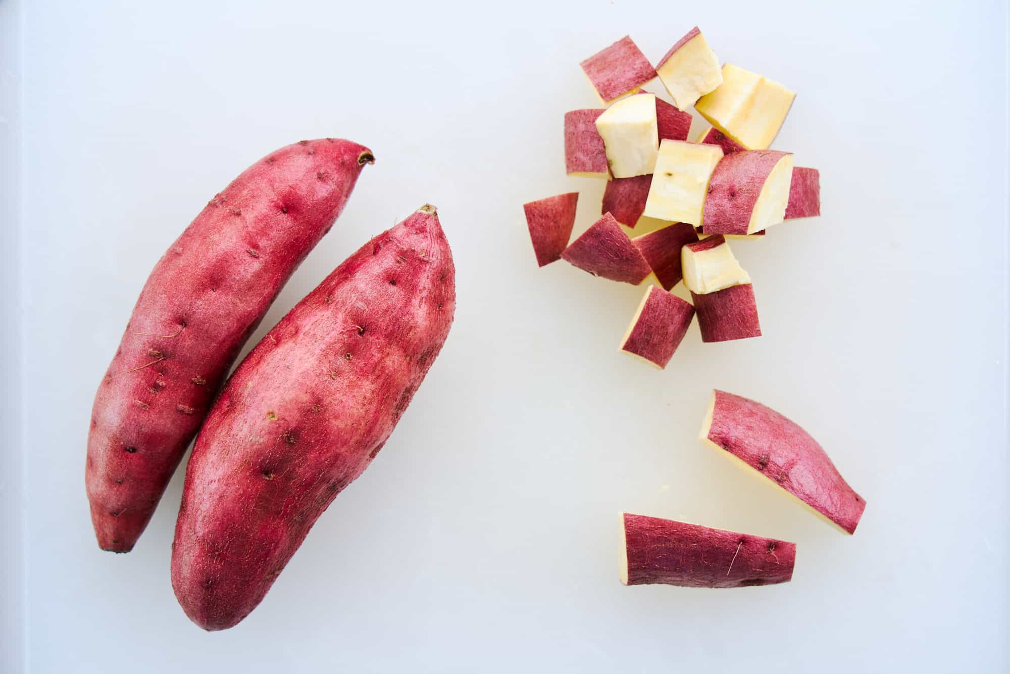 Cutting Japanese sweet potatoes.