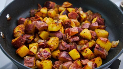 Browned sweet potatoes, onions, and ham.