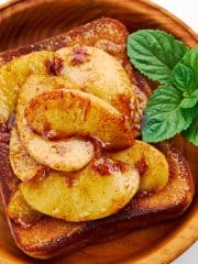 Delicious cinnamon toast gets a topping of sautéed apples.