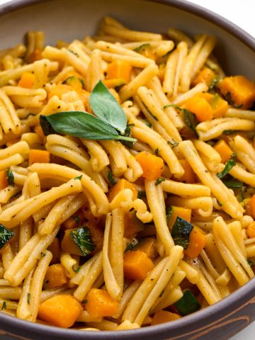 A bowl of savory kabocha squash pasta.