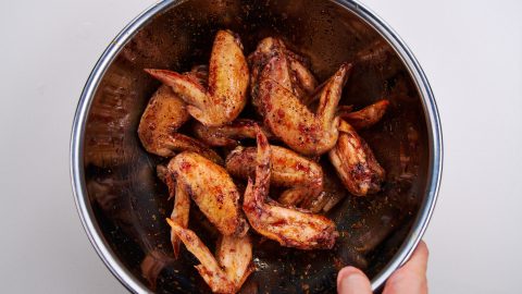 Wings are coated in Tebasaki sauce.