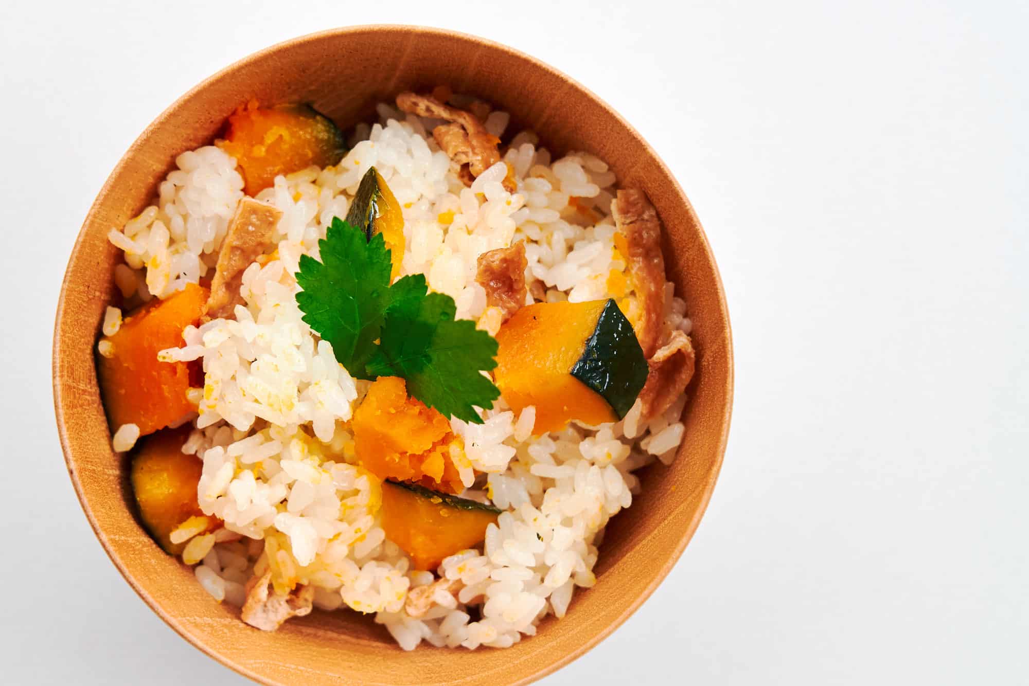 Overhead shot of a bowl of Japanese kabocha pumpkin rice.