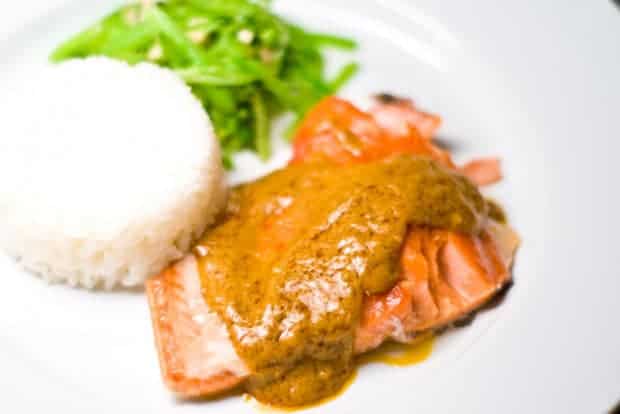 Slow roasted salmon served with a curry sauce.