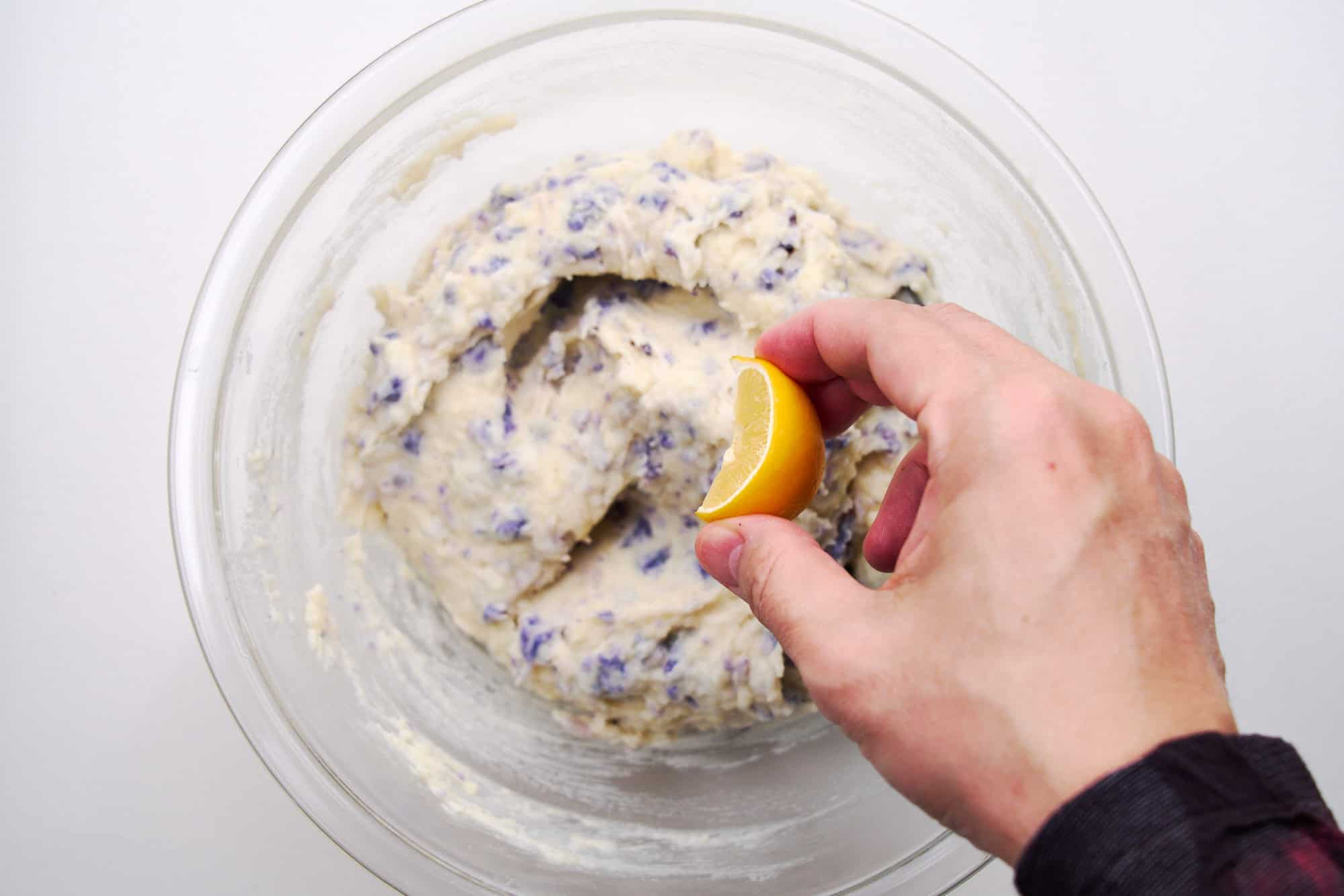 Squeezing lemon into the potatoes changes the color.