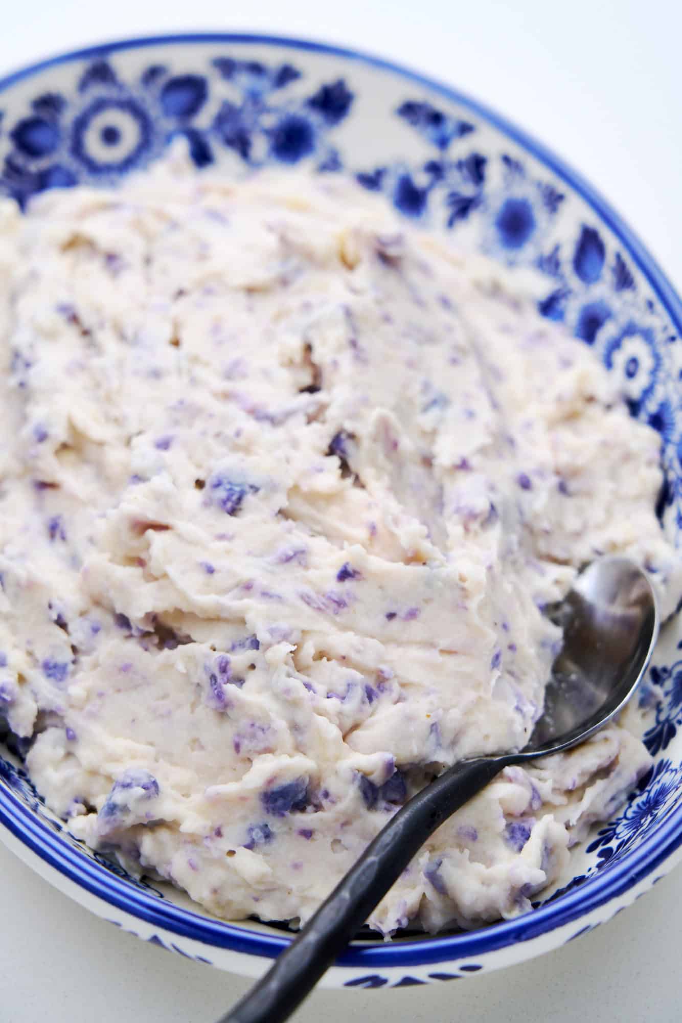 A fun way to include cruciferous vegetables in your meal by mashing purple cauliflower into potatoes.