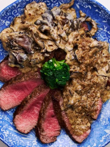 Tenderloin slices with mushroom wine cream sauce.