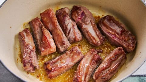Browning the beef rib fingers.