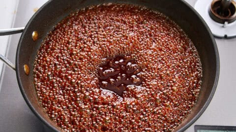 Reducing the liquid to make a sauce.