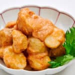 Spicy mentaiko and creamy butter adorn these steamed potatoes.