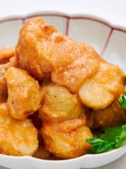 Spicy mentaiko and creamy butter adorn these steamed potatoes.