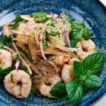 Slippery glass noodles, tender shrimp, bright herbs, and crunchy toasted rice powder make this salad a textural feast.