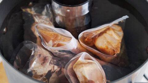 Chicken breasts in bags with an immersion circulator.