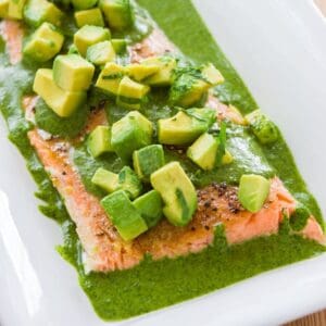 Tender salmon topped with salsa and avocado.