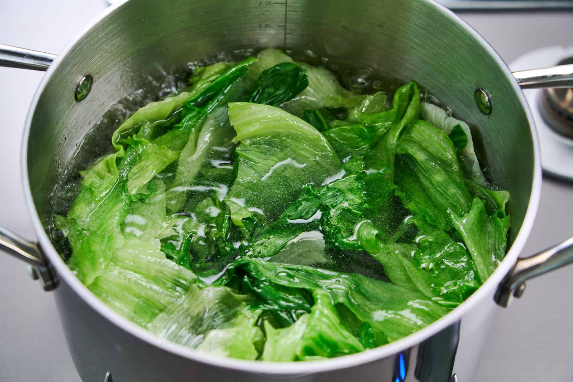 Blanching the lettuce before dressing.