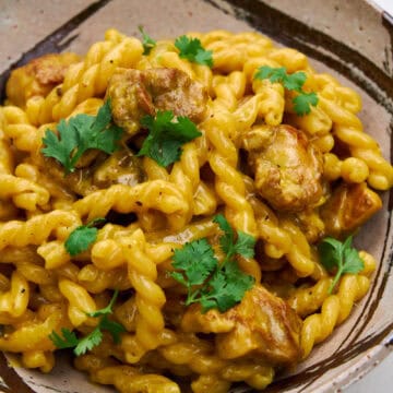 Spicy sauce enrobes tender chicken and al dente pasta.
