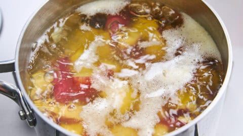 Boiling the sweet potatoes.