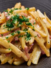 Batons of potato cooked with pancetta and coated in a silky egg sauce.