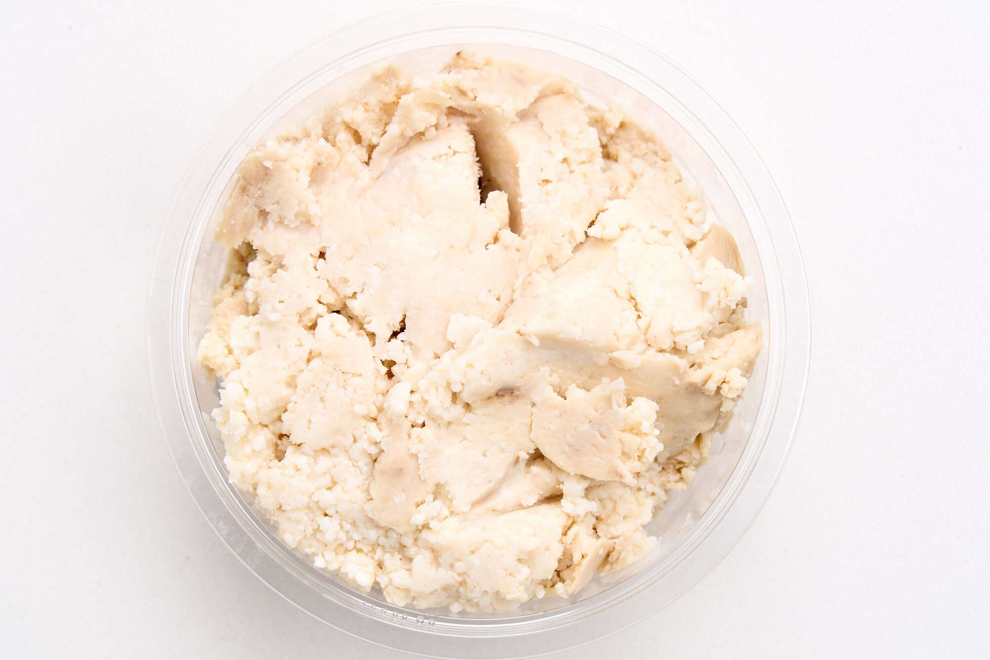 Sake kasu as it appears in a tub.