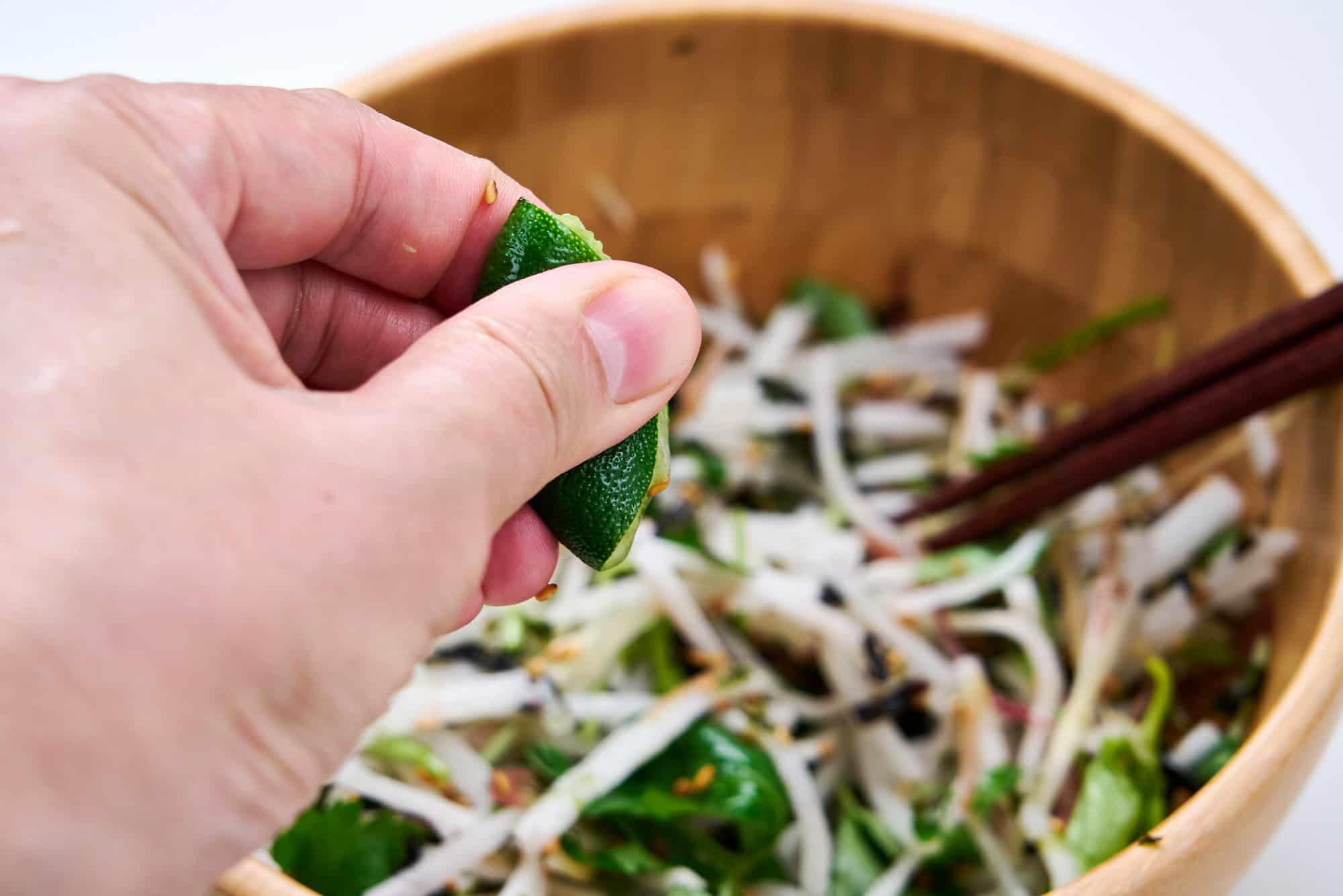 Anointing the greens with citrus.