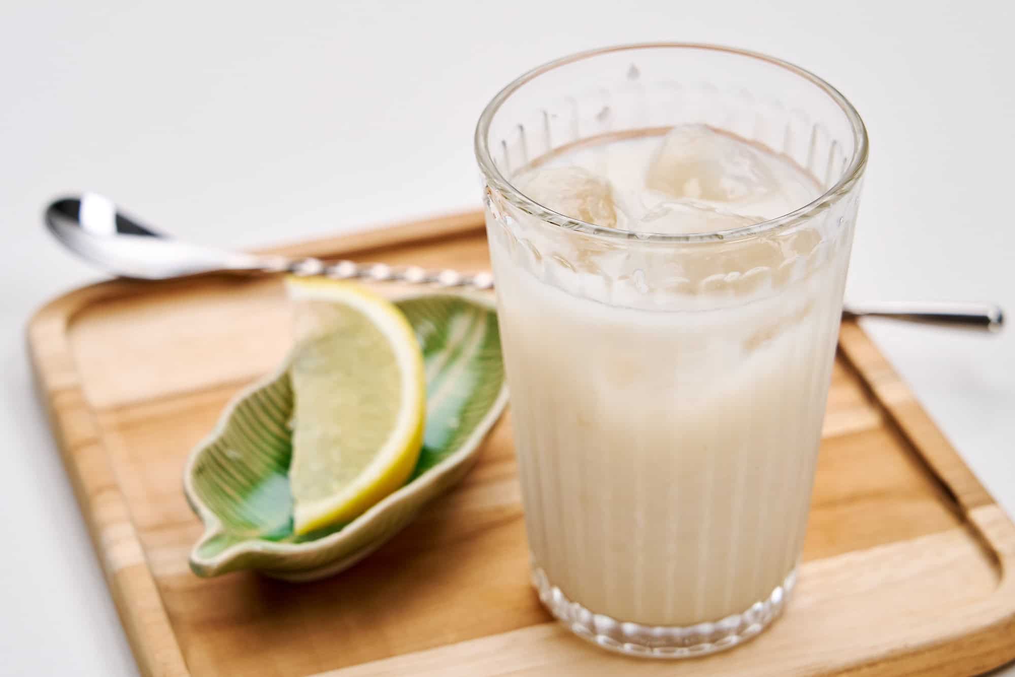 A refreshing glass of amazake with lemon.