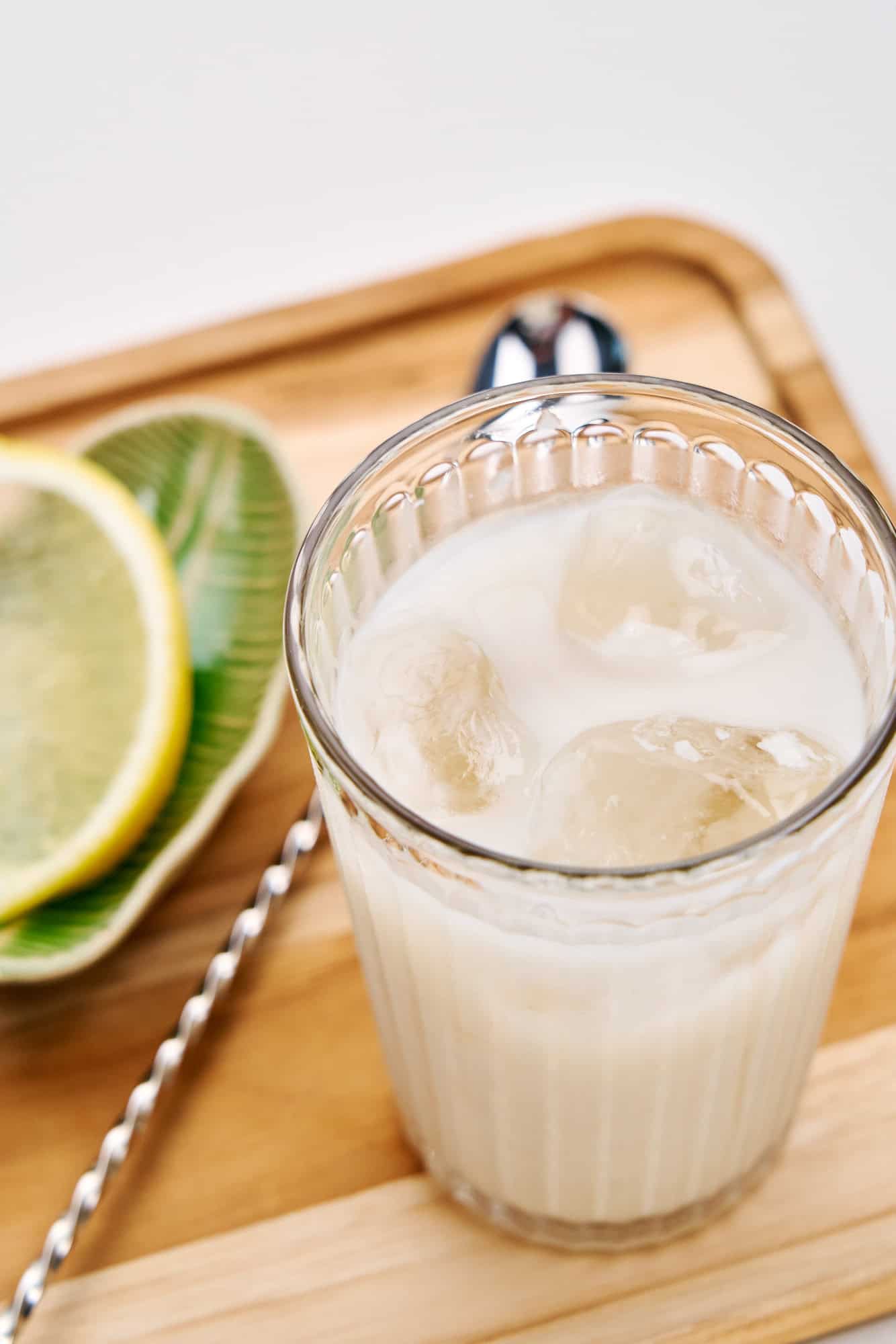 A refreshing glass of amazake with lemon.