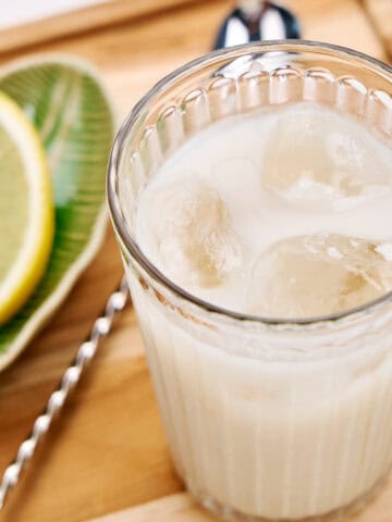 A refreshing glass of amazake with lemon.