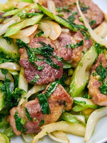 Pork and Celery Stir Fry on a white plate.