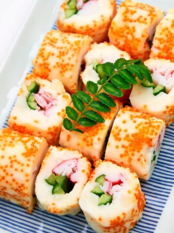 Rolls made with mashed potato and filled with vegetables and imitation crab, then rolled in fish eggs.