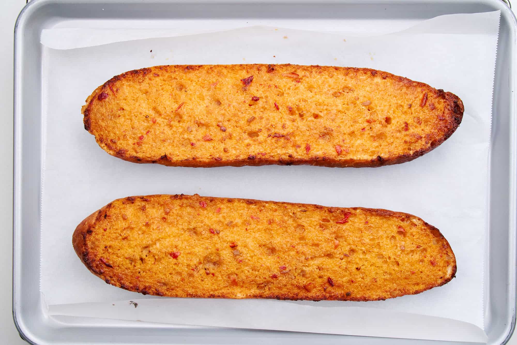 Golden toasted bread with mala butter.