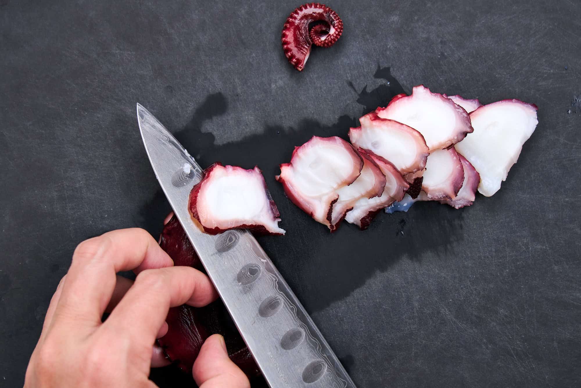 Thinly slicing the octopus gives it a delightful texture.
