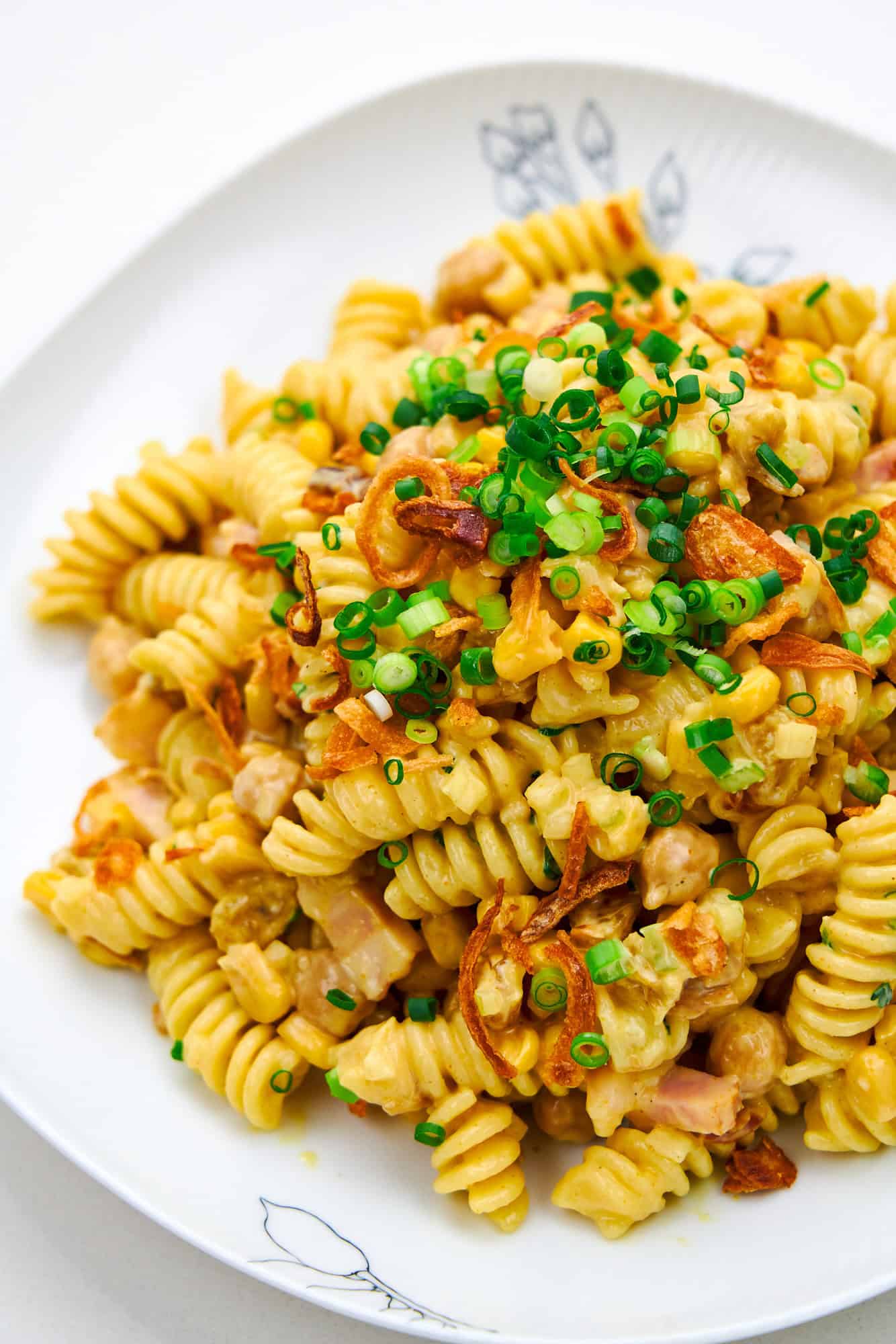 A plate piled high with Curry Pasta Salad.