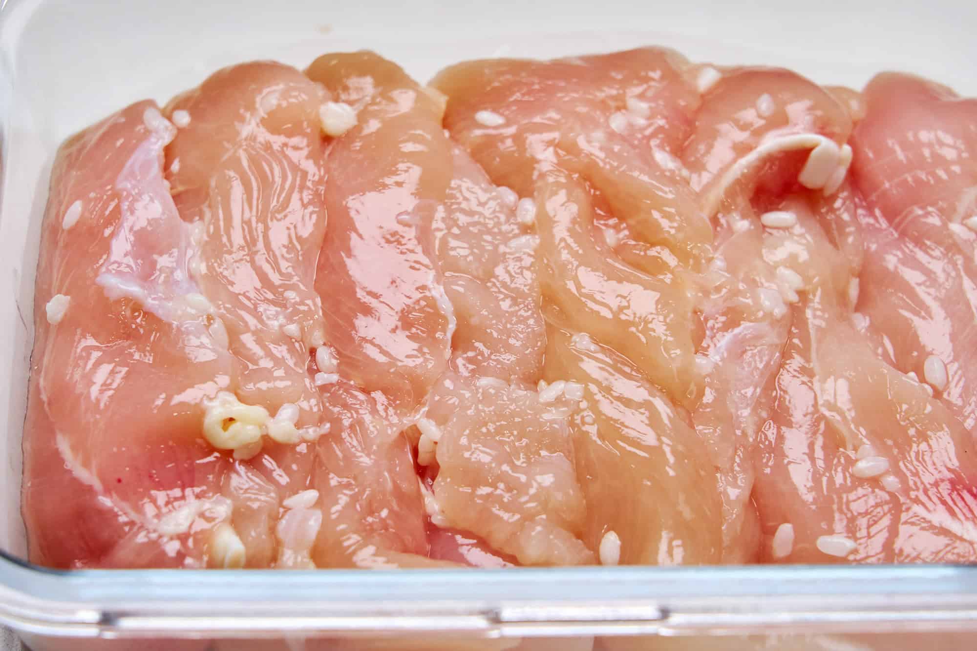 Chicken tenders after being marinated in koji.