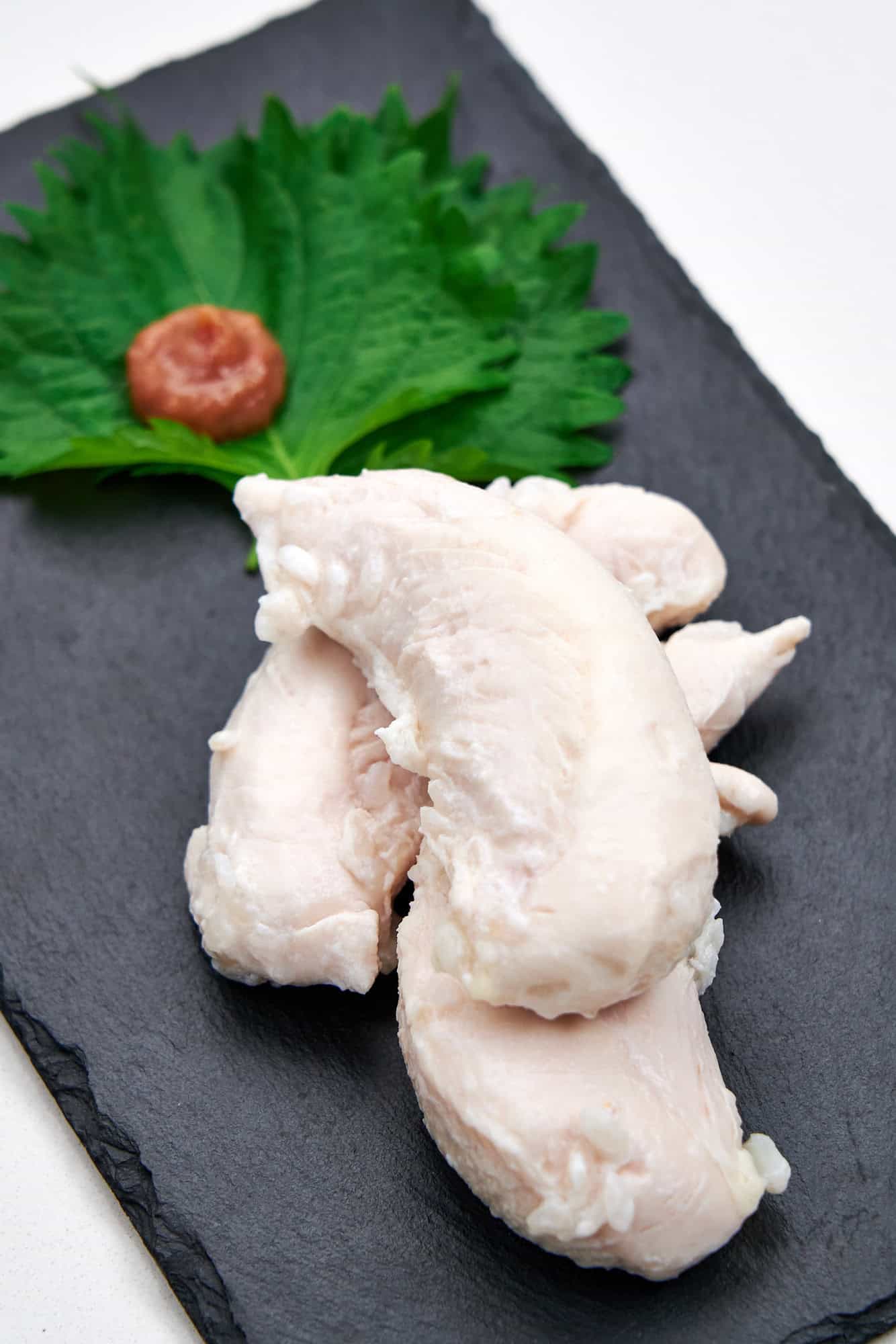 A plate of juicy, tender koji cured chicken.